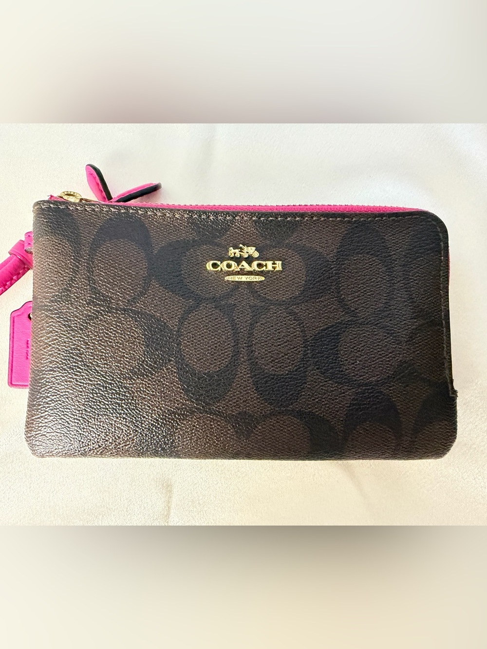 Coach Brown Signature Clutch with Pink Trim